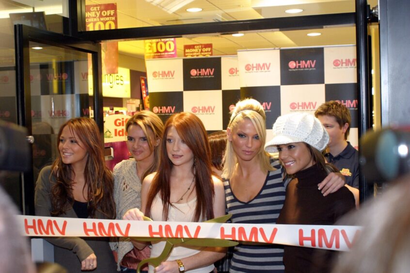 Girls Aloud getting ready to cut the ribbon in 2005 at Kirkcaldy HMV