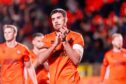 Declan Gallagher salutes Dundee United fans after their loss to Motherwell. Image: Euan Cherry/Shutterstock