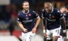 Dundee goalscorer Ziyad Larkeche jokes with compatriot Mo Sylla after Dundee beat Kilmarnock. Image: Mark Runnacles/Shutterstock