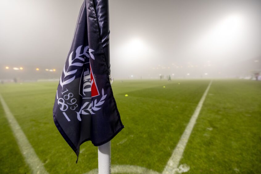 Fog covers Dens Park. Image: Alan Rennie/Shutterstock