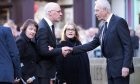 John Swinney and wife Elizabeth arrive at the Alex Salmond memorial service. Image: Stuart Wallace/Shutterstock