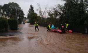 Rescuers take Brechin residents to safety during Storm Babet.  Image: Paul Reid