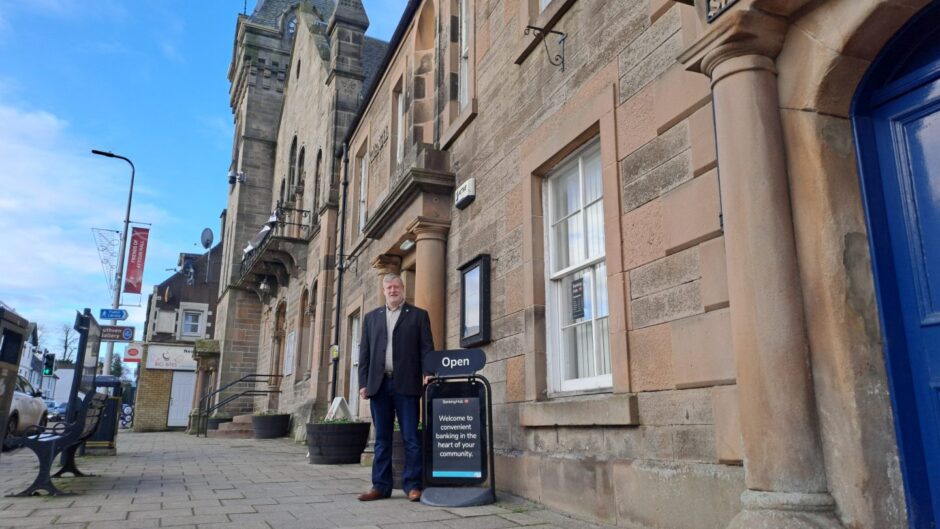 Councillor Steven Carr at door to Aytoun Hall