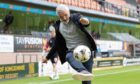 Dundee United boss Jim Goodwin shows he hasn't lost his touch after his side knocked St Mirren out of the Premier Sports Cup in August. Image: SNS