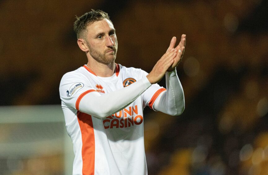 Dundee United's Louis Moult is desperate to get back on the pitch