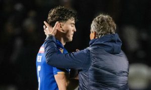 Lewis Neilson shakes Simo Valakari's hand after a game.