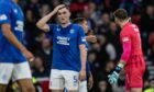 Rangers' ex-Dundee United star John Souttar cuts a frustrated figure in action against Motherwell. Image: Craig Williamson/SNS