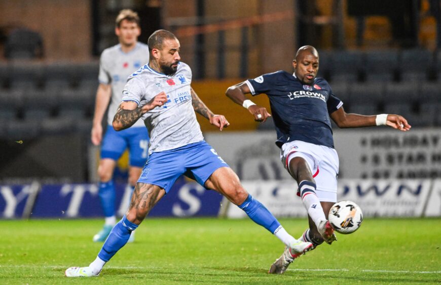 Kyle Vassell, left, in action against Dundee.