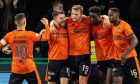 The togetherness of Dundee United players during a recent game at Hibs