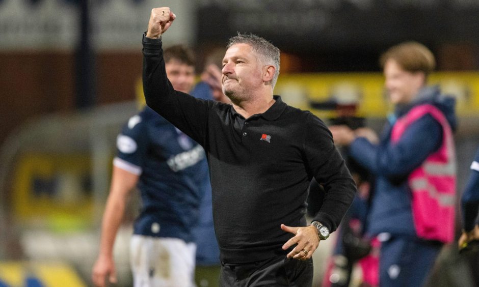 Dundee boss Tony Docherty salutes the Dens Park fans.