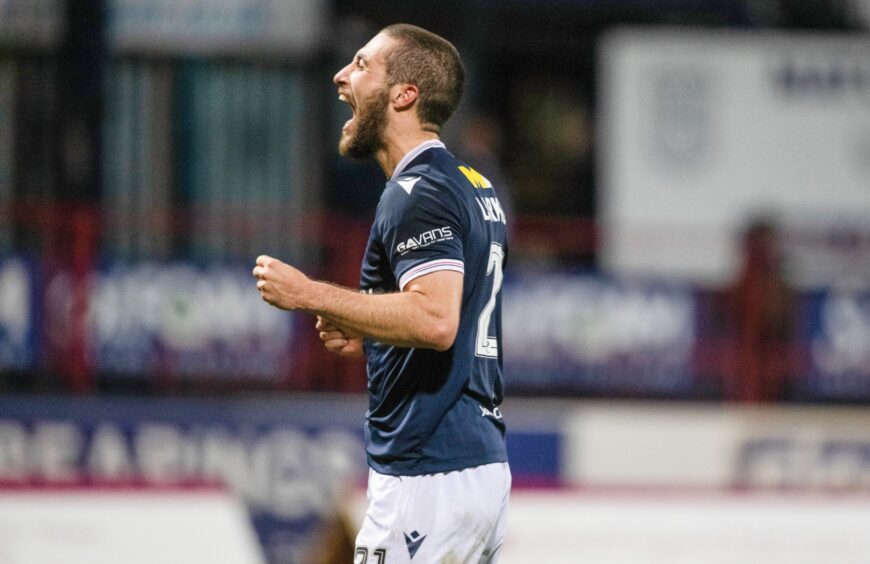 Ziyad Larkeche enjoys his winner for Dundee against Kilmarnock. Image: Paul Devlin/SNS