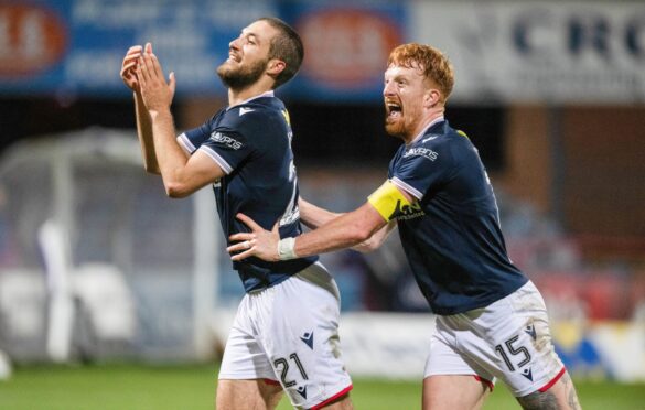 Ziyad Larkeche and Simon Murray celebrate the winner. Image: Paul Devlin/SNS