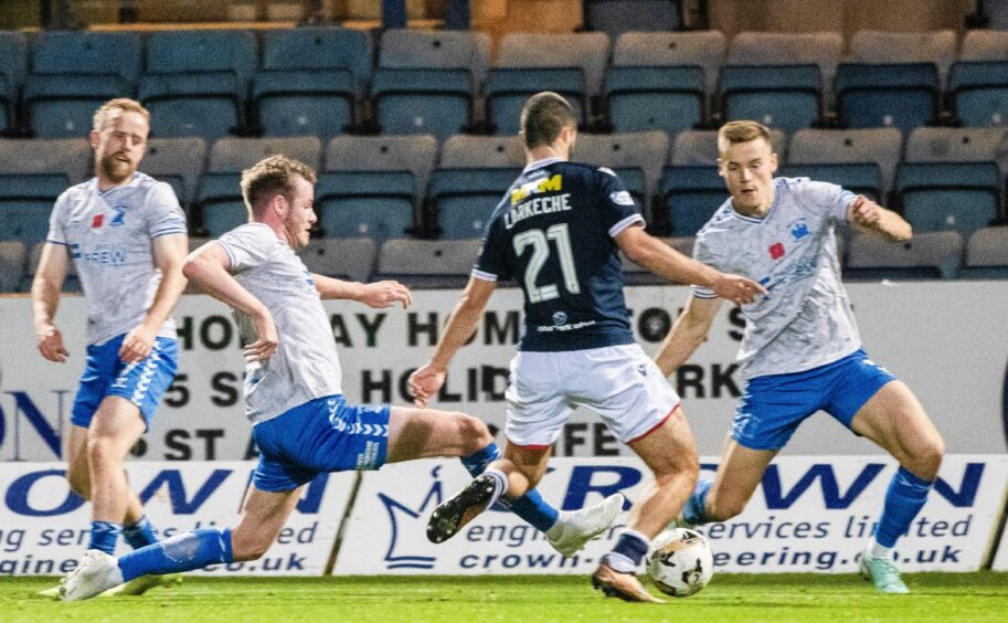 Ziyad Larkeche wins it for Dundee with his third goal of the season. Image: Paul Devlin/SNS