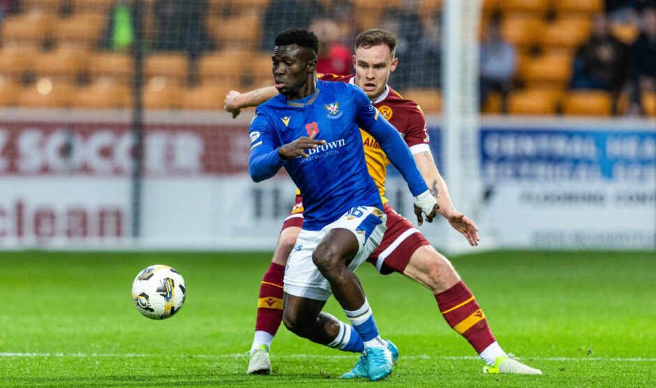 Adama Sidibeh attempting to hold the ball up against Motherwell.