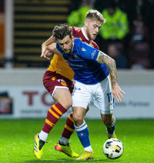 Graham Carey in action against Motherwell. 