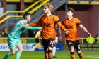 Dundee United's Luca Stephenson takes the acclaim from fans