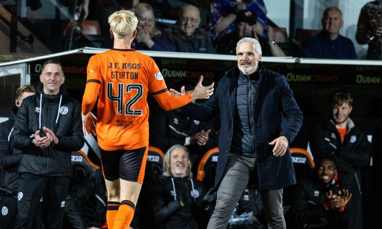 Owen Stirton celebrates his goal with Jim Goodwin