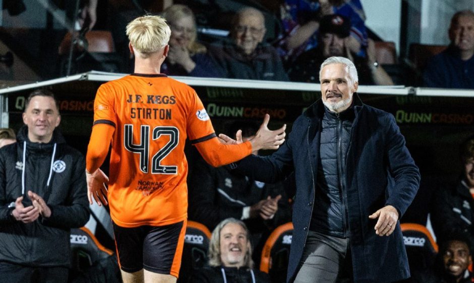 Owen Stirton celebrates his goal with Jim Goodwin