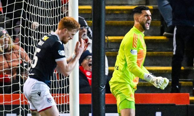 Dundee striker Simon Murray reacts to his first-half penalty miss against Aberdeen.