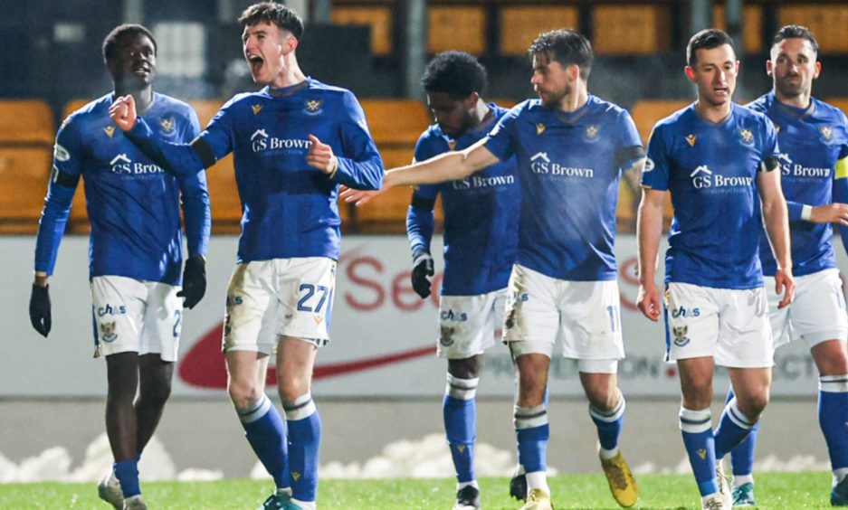 The St Johnstone players celebrate Makenzie Kirk's winning goal against Kilmarnock.