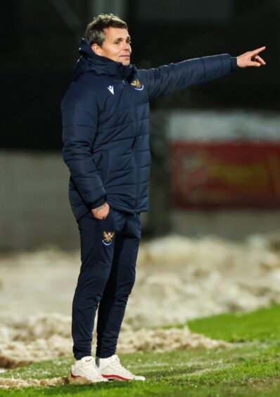 Simo Valakari watches from the touchline.