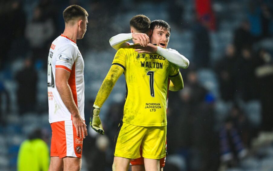 Dundee United's Ryan Strain hails his keeper following a stunning stop