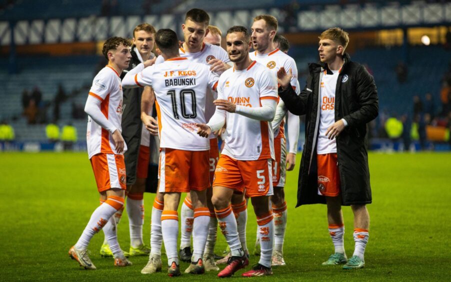 Vicko Sevelj, No,5, soaks up the adulation of the United fans along with his Terrors' teammates