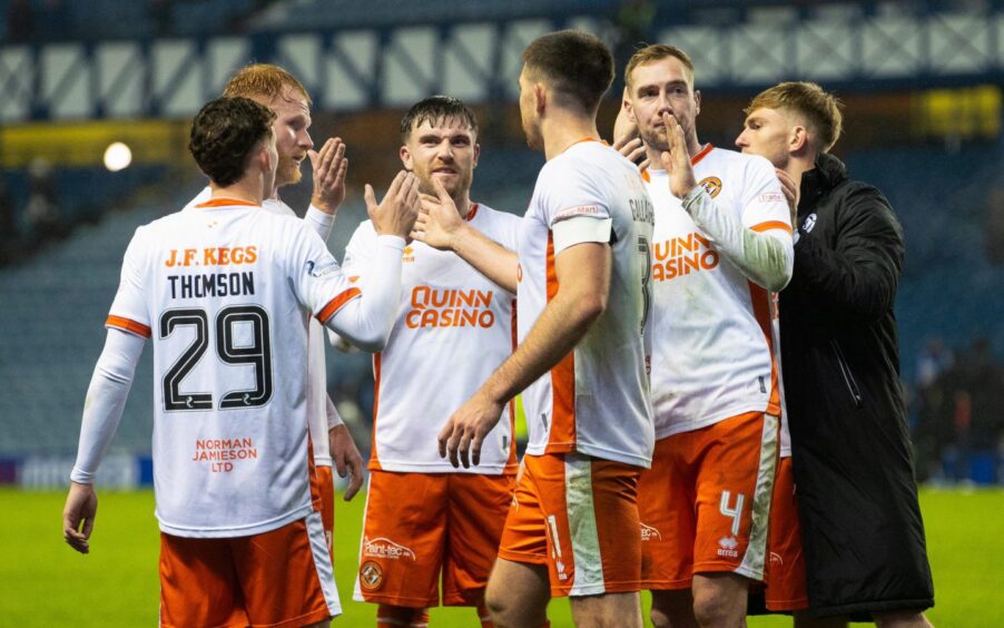 The Dundee United players deservedly take the acclaim from their fans.