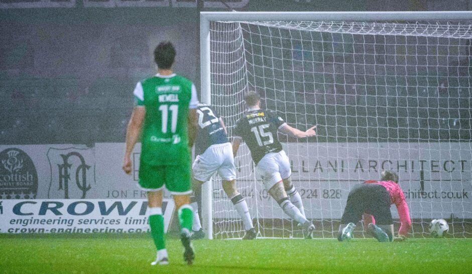 Dundee's Seb Palmer-Houlden robs Josef Bursik. Image: Euan Cherry/SNS