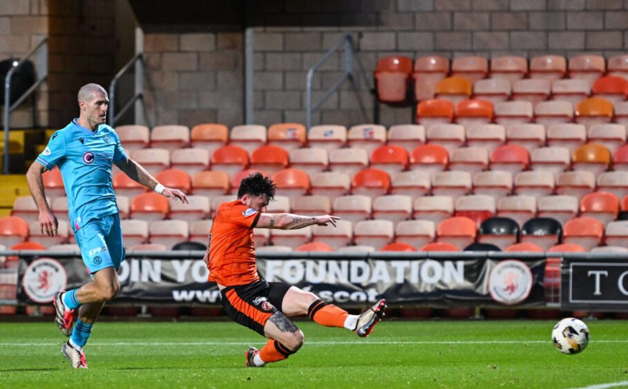 Will Ferry, still searching for his first Dundee United goal, rattles the base of the post.