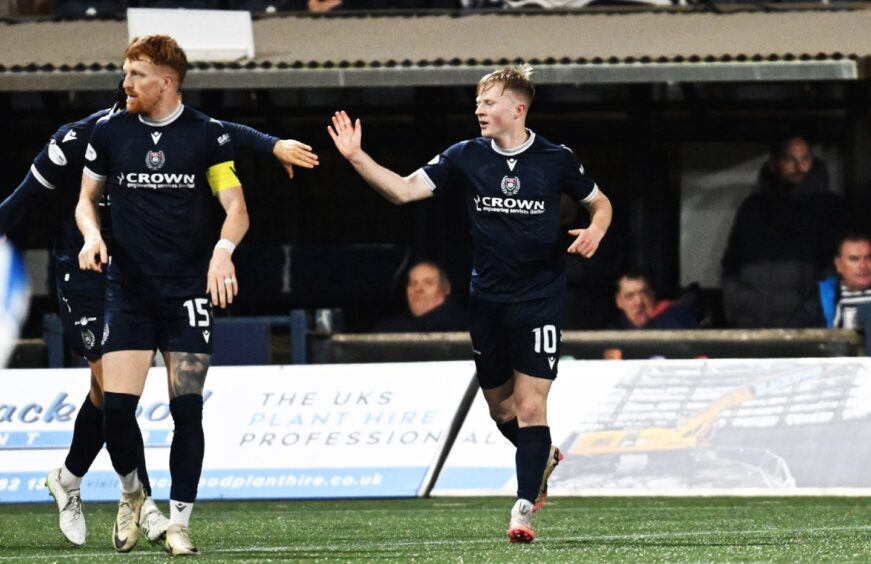 Lyall Cameron takes the acclaim of his Dundee team-mates at Kilmarnock. Image: Rob Casey/SNS