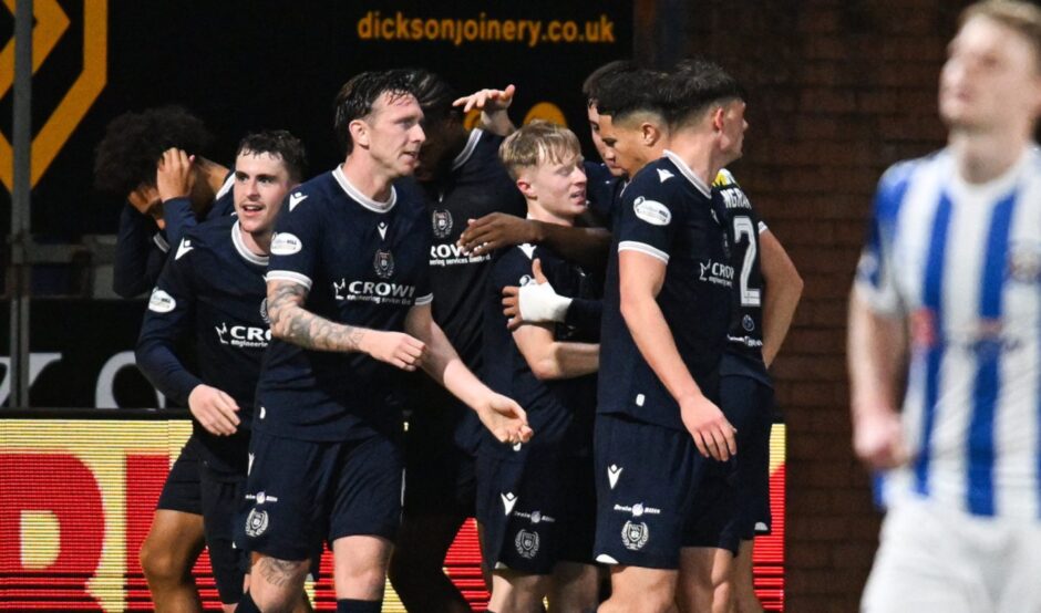 Dundee celebrate their opener. Image: Rob Casey/SNS