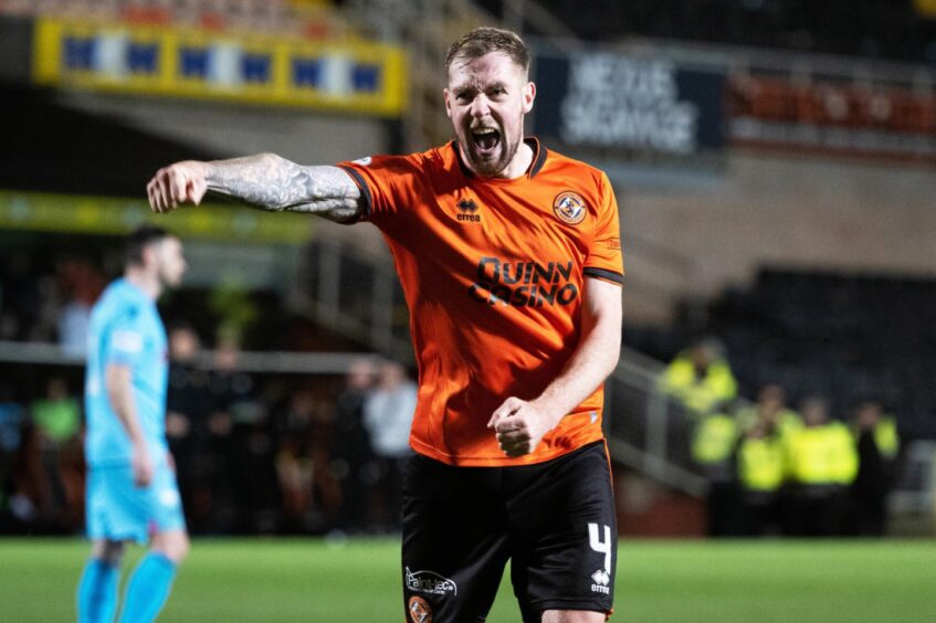 Kevin Holt celebrates after giving Dundee United the lead.