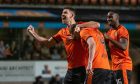 Dundee United's imperious back-three of (L to R) Gallagher, Holt and Adegboyega.