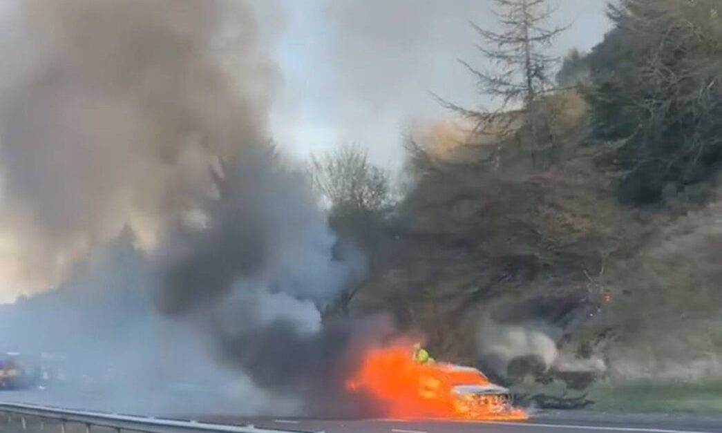 Car on fire on M90.