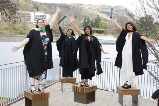 Friends gathered together to celebrate their academic achievements, posing for photos in front of the loch. Images: University of Stirling