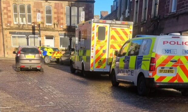 Police and paramedics in Kirriemuir town centre. Image: Supplied