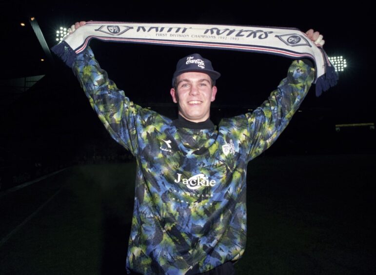 Brian Potter holds up a Raith Rovers scarf after the Coca-Cola Cup semi-final win over Airdrie in 1994.