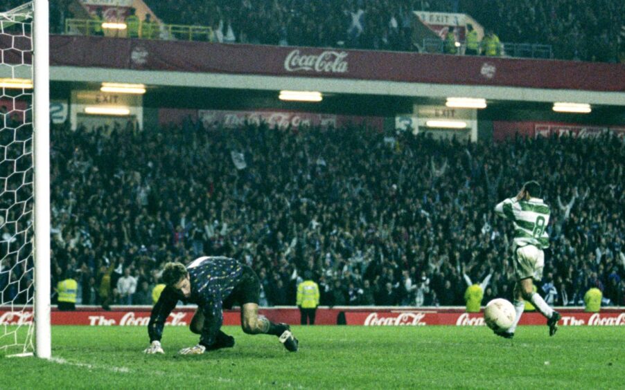 Scott Thomson saves Paul McStay's pivotal penalty with the Rovers fans celebrating in the background.