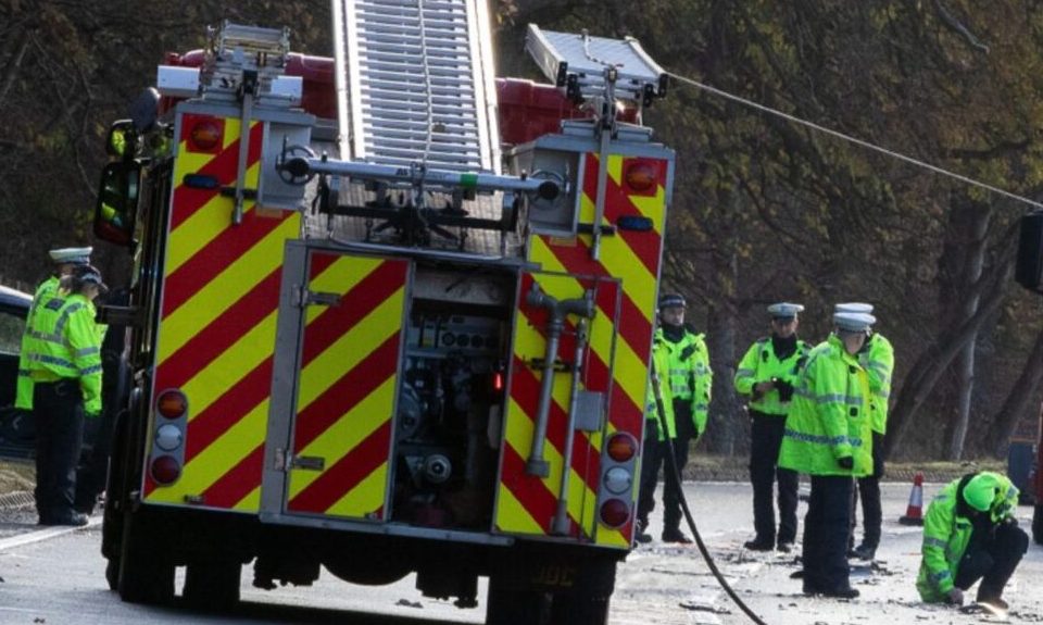 Police and firefighters at the scene of the A9 crash near Ballinluig. Image: Marieke McBean