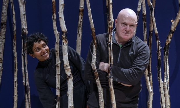 Artists Hamshya Rajkumar and Frank McElhinney alongisde their artwork Extraction 2023 which features silver birch saplings gathered from Ravenscraig, Image: Jane Barlow/PA Wire