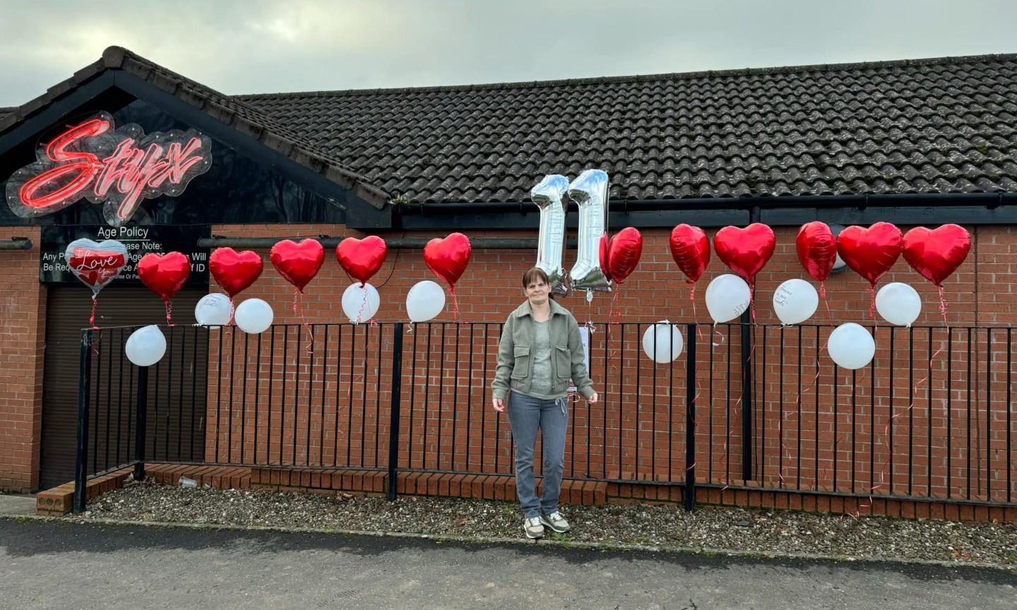 Allan Bryant's mum, Marie Dugan, with the balloon tribute.