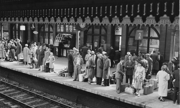 A busy scene at Arbroath Railway Station in August 1958. Image: Supplied.