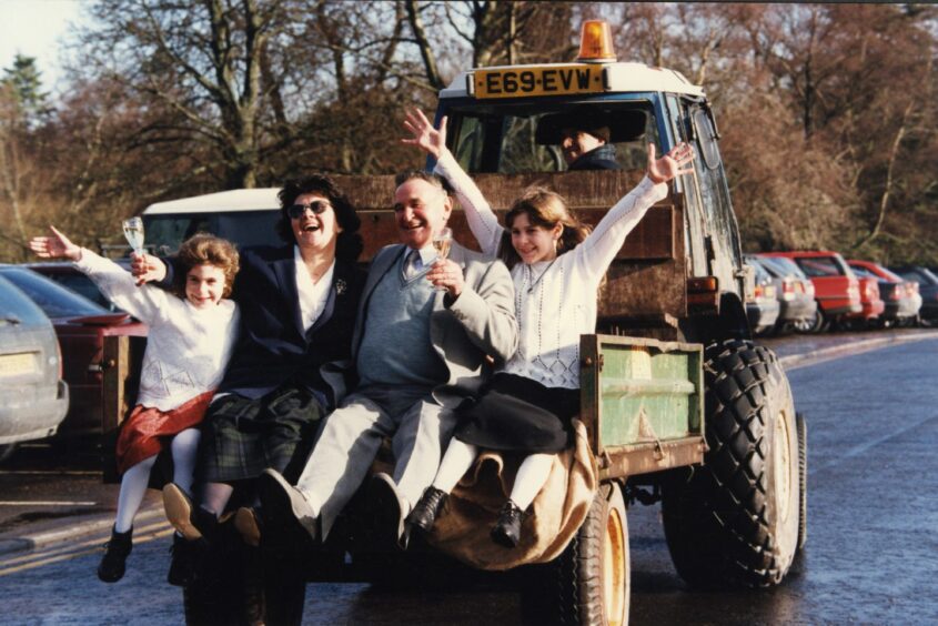 National Lottery winners Margaret and Bill Watson celebrating with their grandchildren at Gleneagles