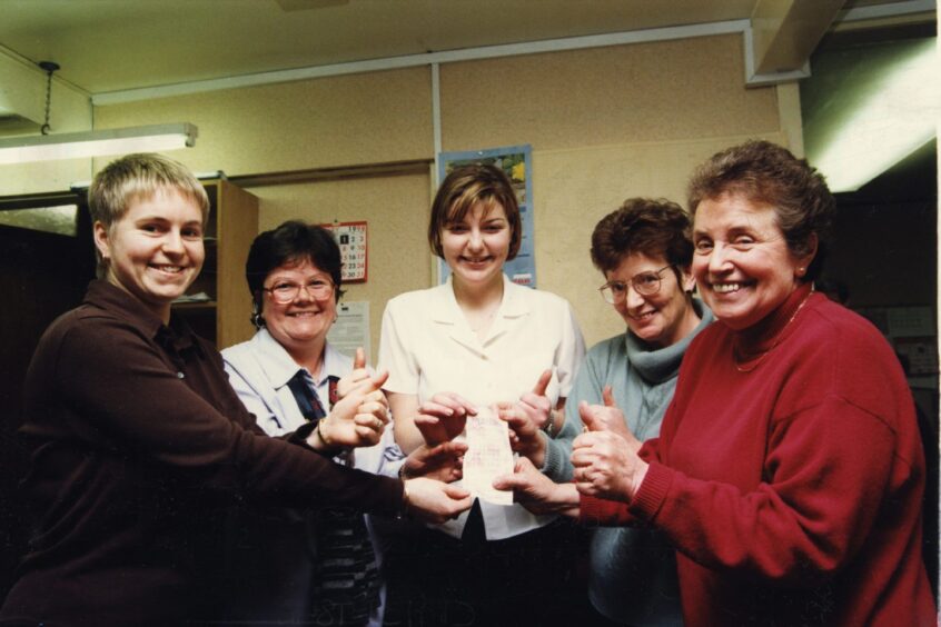 Council staff in Arbroath celebrate their win on the National Lottery in 1998.