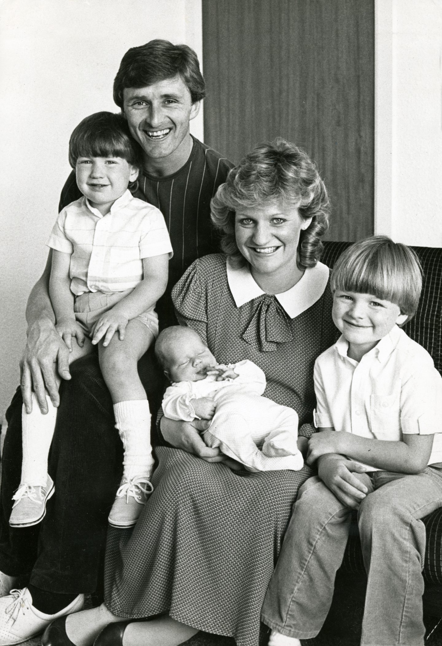 Sitting on the couch are Hegarty and wife Linda with Mark, baby Christopher and Paul in 1984.