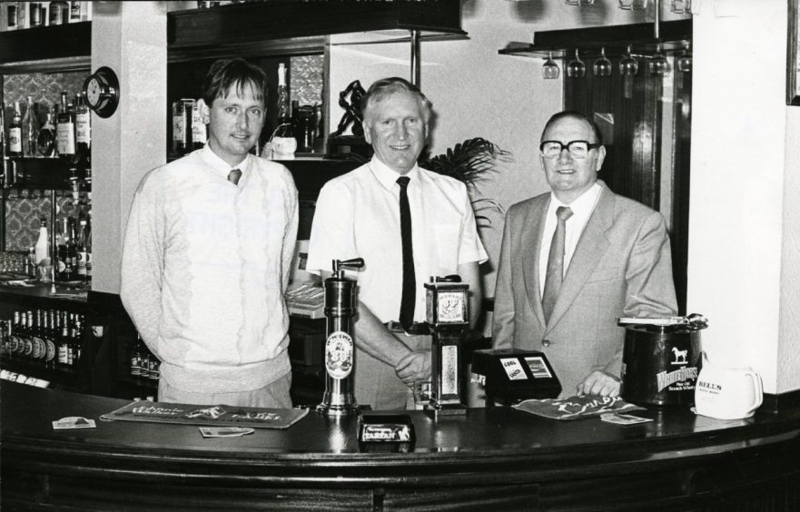 George Kidd Junior, Ron MacLaughlan and George Kidd in the pub in 1986.