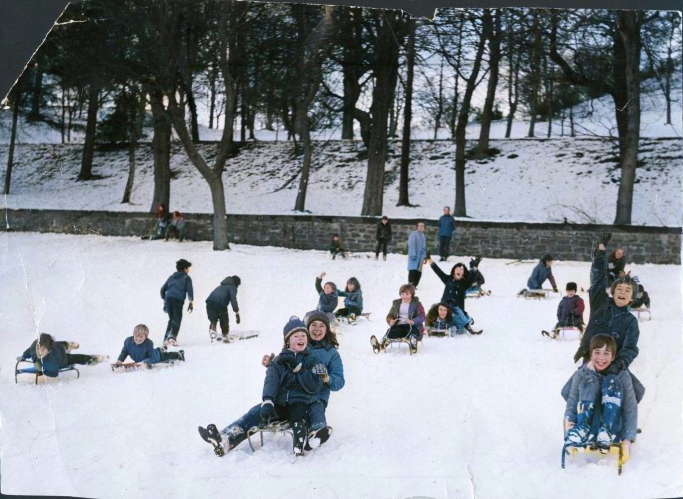 Children sledging at Lochee Park in 1973