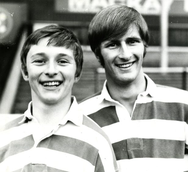 Paul Hegarty and his brother Kevin in 1970, wearing football tops and smiling