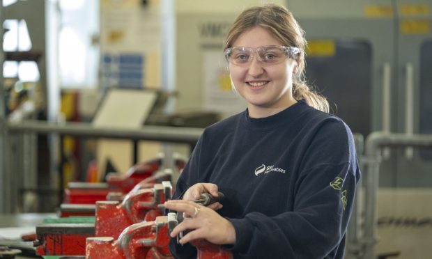 Engineering apprentice Charly Simpson operating machinery at Fife College Rosyth Dockyard campus